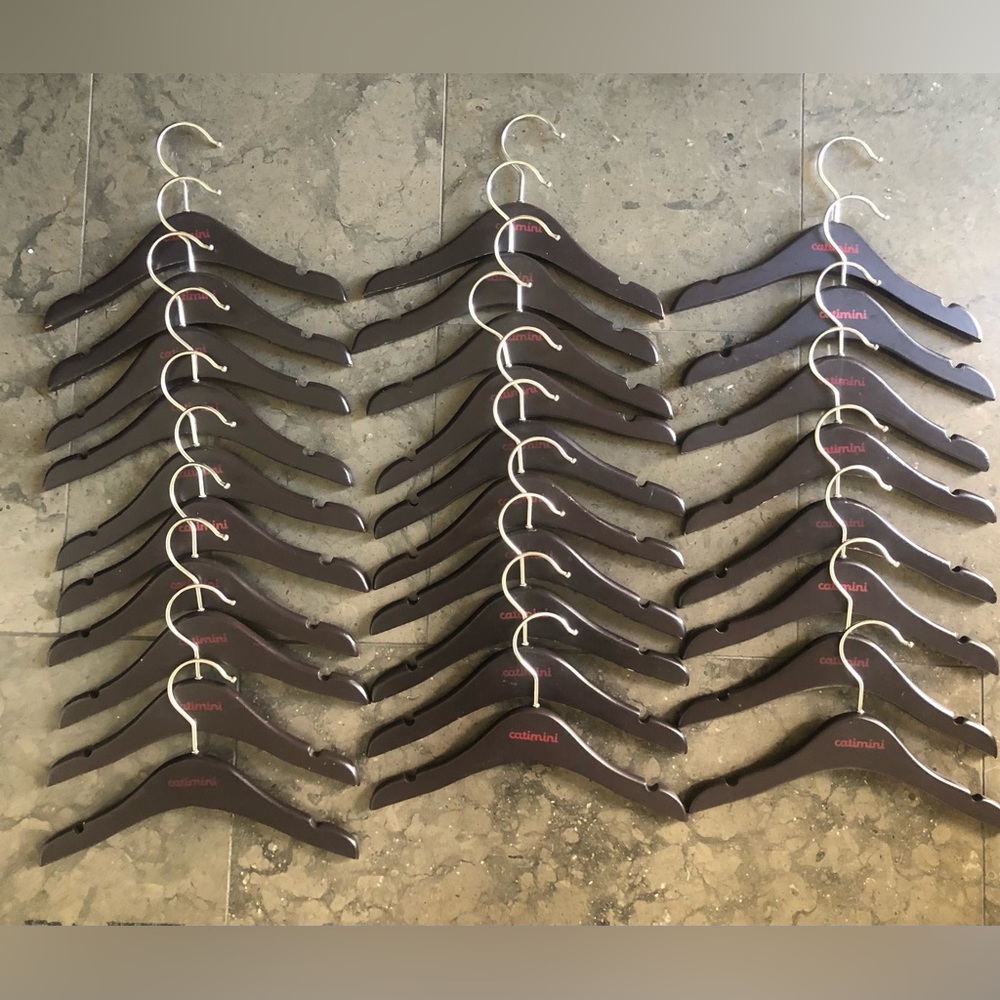 28 Kids wooden hangers for tops.